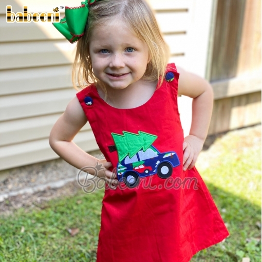 Lovely baby in Christmas applique dress