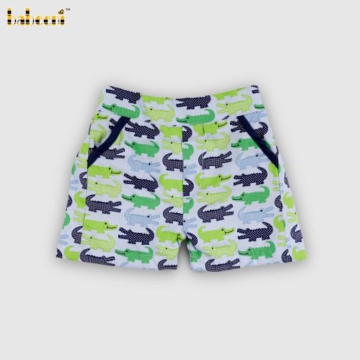 Blue and green crocodile print shorts.- BB3562