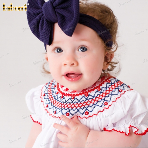 Smocked Bishop In White With Red Accent Around Neck And Sleeve For Girl  