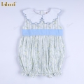 a-light-blue-plain-dress-with-a-floral-pattern-and---bb3557