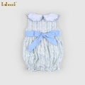 a-light-blue-plain-dress-with-a-floral-pattern-and---bb3557
